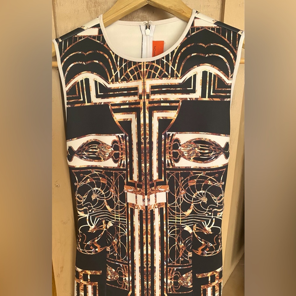 Fun, flattering Clover Canyon bodycon dress. (I wear a 2/4 and this fits well.)